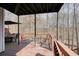 Deck with seating and umbrella, perfect for outdoor entertaining at 802 Eagle Glen Xing, Woodstock, GA 30189