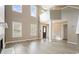 Spacious living area with large windows, fireplace, hardwood floors, and natural light at 802 Eagle Glen Xing, Woodstock, GA 30189