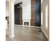 Bright living room featuring high ceilings, statement fireplace, and hardwood floors, perfect for relaxing or entertaining at 802 Eagle Glen Xing, Woodstock, GA 30189