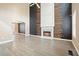 Spacious living room featuring hardwood floors, a fireplace, and lots of natural light at 802 Eagle Glen Xing, Woodstock, GA 30189