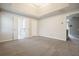 Light and bright bedroom offers tray ceilings, recessed lights, and an ensuite bathroom at 802 Eagle Glen Xing, Woodstock, GA 30189