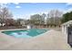 Inviting community pool surrounded by concrete deck, offering a refreshing escape for residents on warm days at 802 Eagle Glen Xing, Woodstock, GA 30189