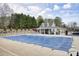 Community pool shown covered for the off-season and featuring covered pavilion at 802 Eagle Glen Xing, Woodstock, GA 30189