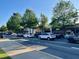 Commercial street view in a charming town lined with trees and shops at 802 Eagle Glen Xing, Woodstock, GA 30189