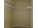 Walk-in closet includes shelving and neutral walls at 1211 Saxony Se Dr, Conyers, GA 30013