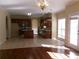Well-lit kitchen with stainless steel appliances, a center island, and tile flooring at 1211 Saxony Se Dr, Conyers, GA 30013