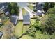 An aerial view of a home on a cul-de-sac with a gray roof and large grassy yard at 16 Montclair Ct, Cartersville, GA 30121