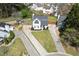 Aerial view of a home with a well-manicured lawn and a long driveway at 16 Montclair Ct, Cartersville, GA 30121