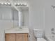 Bathroom features a large mirror, white countertop, and neutral walls at 16 Montclair Ct, Cartersville, GA 30121