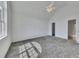 Spacious bedroom features vaulted ceiling, neutral walls, and plush carpet flooring at 16 Montclair Ct, Cartersville, GA 30121