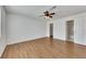 Bright main bedroom features wood laminate flooring, ceiling fan and an attached bathroom at 16 Montclair Ct, Cartersville, GA 30121