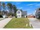 Inviting two-story home with a manicured lawn and private driveway, creating a warm curb appeal at 16 Montclair Ct, Cartersville, GA 30121
