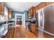 Modern kitchen showcasing stainless steel appliances, granite counters and eat-in dining area at 2628 White Oak Dr, Decatur, GA 30032