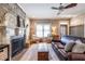Cozy living room showcasing a fireplace with rustic wood accent wall and comfortable seating at 2628 White Oak Dr, Decatur, GA 30032