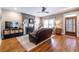 Inviting living room featuring hardwood floors, a fireplace, and comfortable furnishings at 2628 White Oak Dr, Decatur, GA 30032