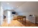 Open living space featuring hardwood floors and a foosball table at 2628 White Oak Dr, Decatur, GA 30032