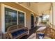 Inviting front porch with wicker furniture and a porch swing for relaxed outdoor living at 2628 White Oak Dr, Decatur, GA 30032