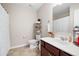 Well-lit bathroom with a modern vanity, mirror, and tile flooring at 353 Franklin Ln, Acworth, GA 30102