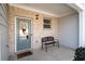 Inviting front porch with a bench, stylish door, and a cozy, welcoming atmosphere at 353 Franklin Ln, Acworth, GA 30102