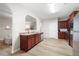 Modern kitchen featuring stainless steel appliances, granite countertops, and ample cabinet space at 353 Franklin Ln, Acworth, GA 30102
