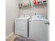 Bright laundry room featuring modern washer and dryer units at 353 Franklin Ln, Acworth, GA 30102