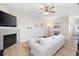 Inviting living room featuring a fireplace, wood floors, and ample natural light at 353 Franklin Ln, Acworth, GA 30102