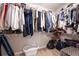 Spacious walk-in closet with ample storage and organization, racks, and shelving at 353 Franklin Ln, Acworth, GA 30102