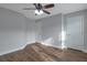Bedroom with hardwood flooring and natural light at 3455 Flycatcher Way, Duluth, GA 30097