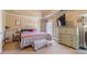 Comfortable bedroom with soft natural light, providing a relaxing atmosphere at 3828 Morning Meadow Ln, Buford, GA 30519