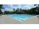 Resort-style community pool with lounge chairs, perfect for relaxation and recreation at 3828 Morning Meadow Ln, Buford, GA 30519