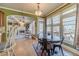 Charming dining area adjacent to the living room with bright natural light at 3828 Morning Meadow Ln, Buford, GA 30519