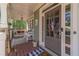 Inviting front porch with rocking chairs, charming decor, and a welcoming entrance to the home at 3828 Morning Meadow Ln, Buford, GA 30519