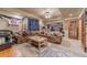 Spacious living room featuring comfortable seating and abundant natural light at 3828 Morning Meadow Ln, Buford, GA 30519