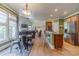 Open-concept living area with a connected kitchen and dining area, ideal for entertaining at 3828 Morning Meadow Ln, Buford, GA 30519