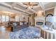 Comfortable living room featuring a fireplace, coffered ceilings, and a large decorative rug at 3828 Morning Meadow Ln, Buford, GA 30519