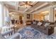 Inviting living room with coffered ceilings and a cozy seating area, perfect for relaxing at 3828 Morning Meadow Ln, Buford, GA 30519