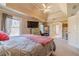 Spacious main bedroom with ample closet space, large windows, and natural light at 3828 Morning Meadow Ln, Buford, GA 30519