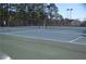 Well-maintained community tennis court perfect for outdoor recreational activities and social gatherings at 3828 Morning Meadow Ln, Buford, GA 30519