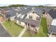 Beautiful home featuring manicured lawn in a Gathering-friendly neighborhood; aerial view at 5034 Little Harbor Way, Acworth, GA 30101