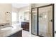 Modern bathroom with a glass-enclosed shower and granite countertops at 5034 Little Harbor Way, Acworth, GA 30101