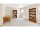 Spacious bedroom filled with natural light and featuring built-in bookshelves at 5034 Little Harbor Way, Acworth, GA 30101