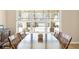 Dining area featuring wood table and chairs by window and view to front yard at 5034 Little Harbor Way, Acworth, GA 30101