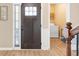 Foyer features a beautiful front door and entryway leading to a laundry room at 5034 Little Harbor Way, Acworth, GA 30101