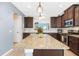 Spacious kitchen featuring a large island with granite countertops and stainless steel appliances at 5034 Little Harbor Way, Acworth, GA 30101
