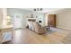 Inviting living room with hardwood floors, a decorative fireplace, and plenty of natural light at 5034 Little Harbor Way, Acworth, GA 30101