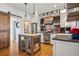 Well-equipped kitchen with a center island, stainless appliances, and custom cabinetry at 1433 Carroll Drive Nw, Unit #3, Atlanta, GA 30318