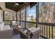 Inviting screened porch offering a serene view of the surrounding greenery, perfect for relaxation at 1433 Carroll Drive Nw, Unit #3, Atlanta, GA 30318