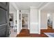 Bright foyer with hardwood floors flowing into other rooms, a charming entry to a comfortable home at 6009 Wyndham Woods Dr, Powder Springs, GA 30127