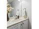 Bathroom vanity with white cabinet and towels at 880 Hillary Ln, Lawrenceville, GA 30043