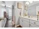 Well-maintained bathroom with vanity, mirror and wood look floors at 880 Hillary Ln, Lawrenceville, GA 30043